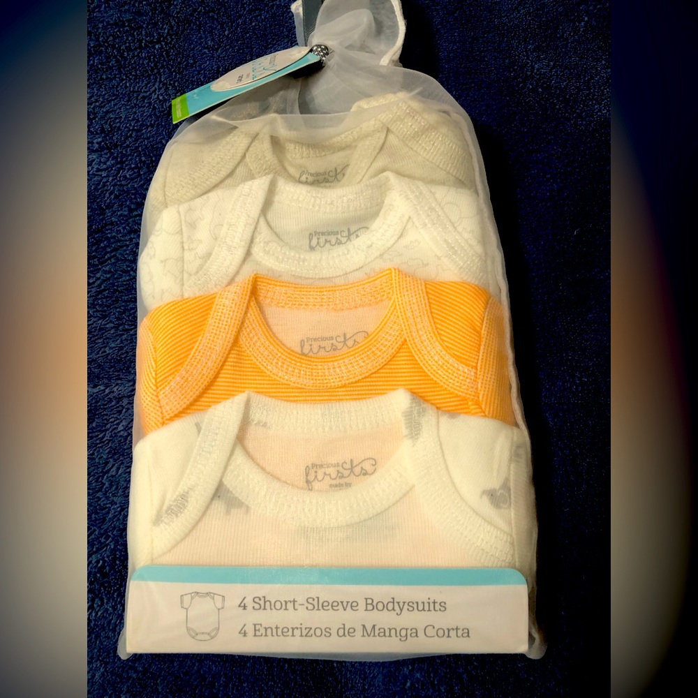 New Carter’s “precious firsts” preemie onesies.  Pack of 4.